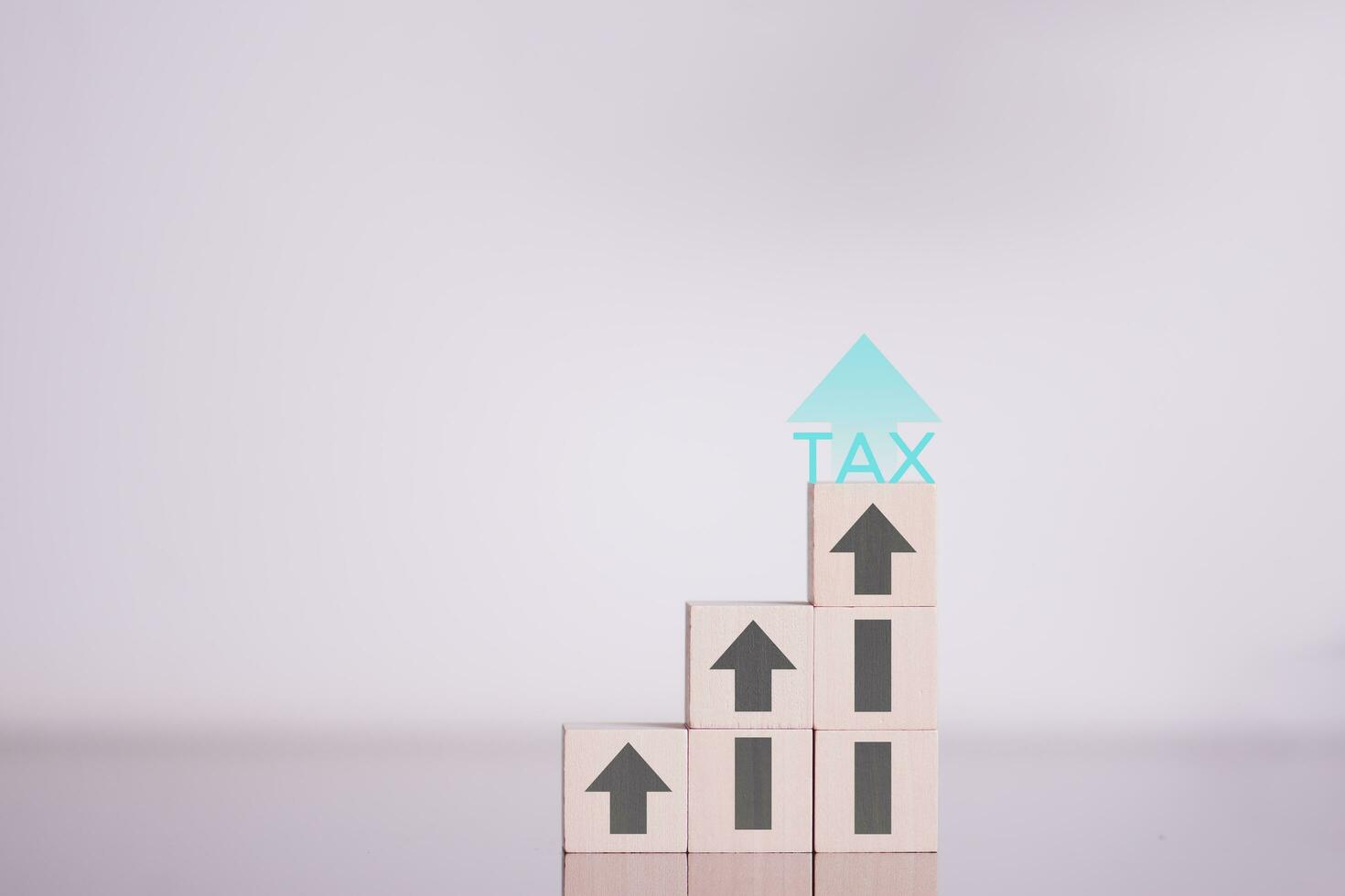 financial research government tax and calculation tax return concept Businessman showing holographic tax on hand Online tax return form filling concept for payment, online marketing, business process. photo