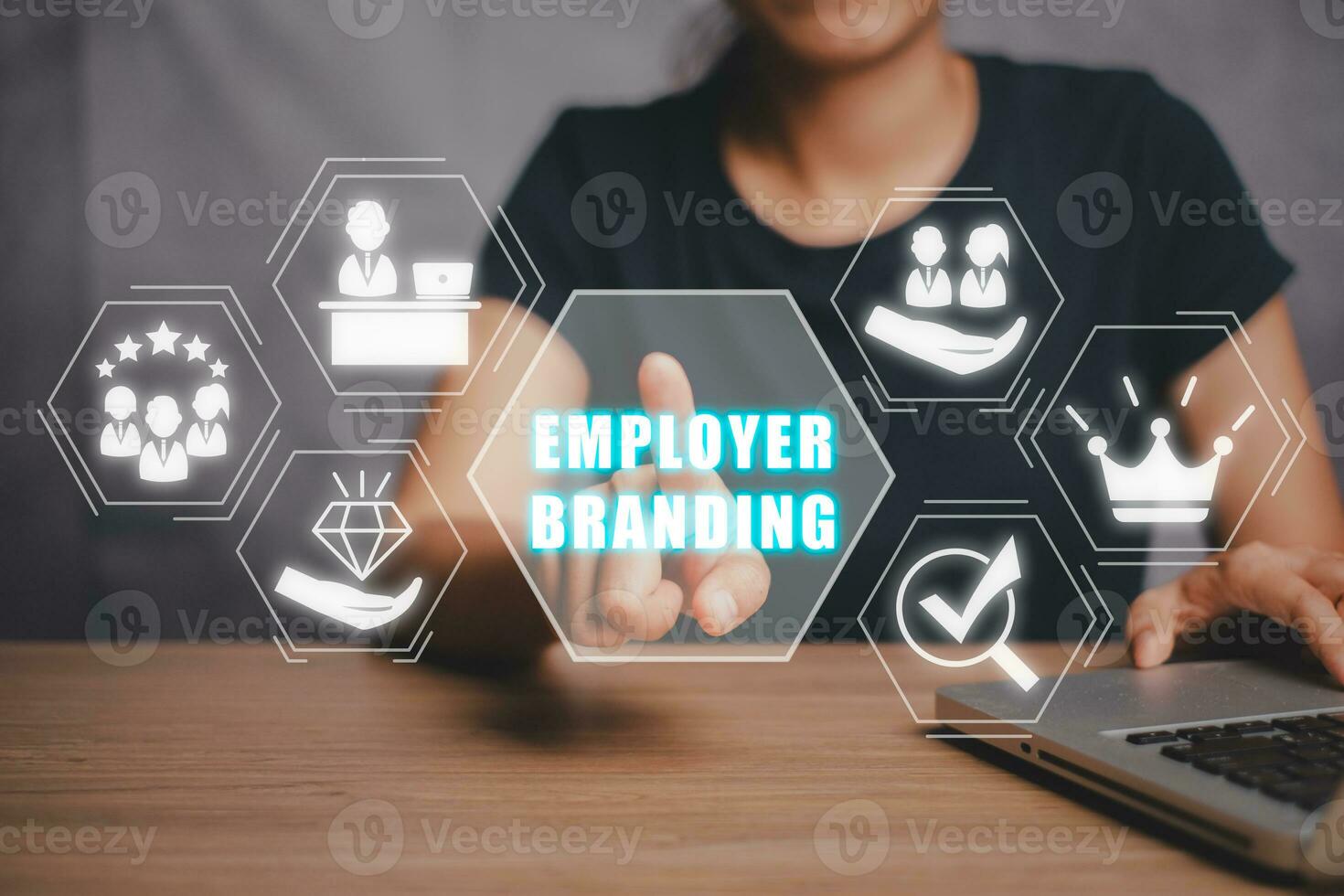 Employer branding concept, Person hand touching employer branding icon on virtual screen. photo