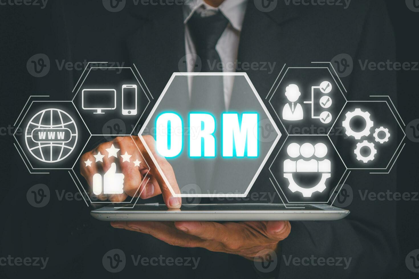 ORM, Online Reputation Management Optimization Business concept, Businessman using tablet with Online Reputation Management icon on virtual screen. photo