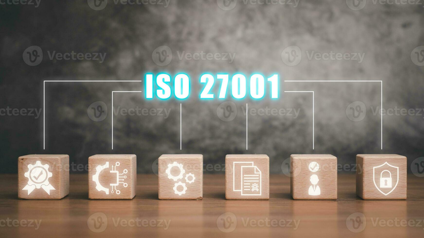 Iso 27001 concept, Wooden block on desk with iso 27001 icon on virtual screen. photo