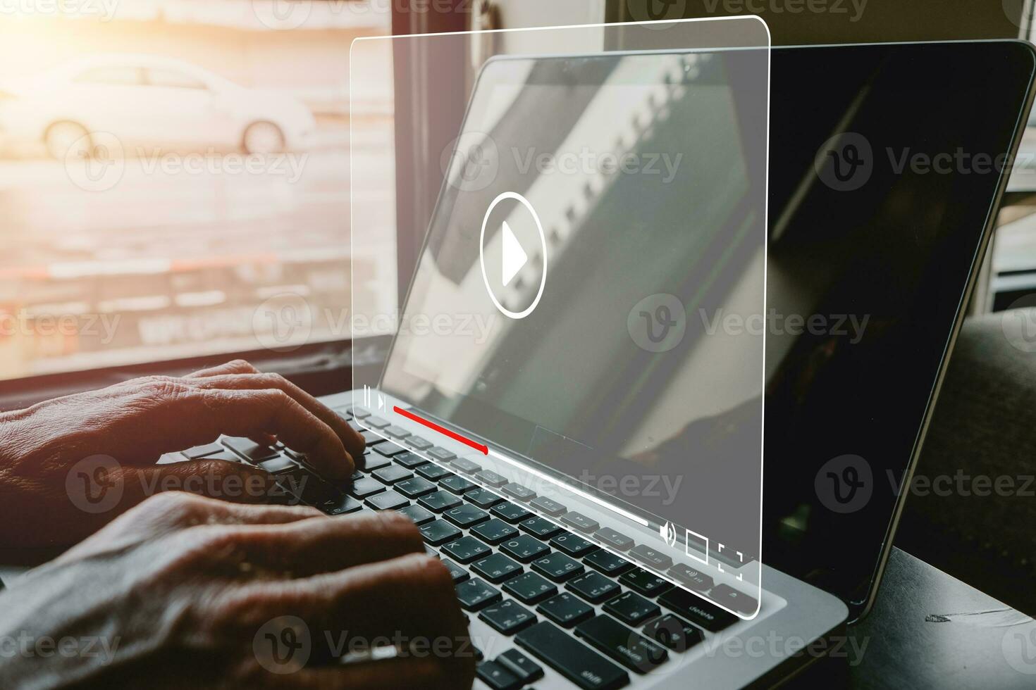 Video streaming on internet, Person watching online movie or TV series on laptop computer, Concept about subscription based live digital stream. photo