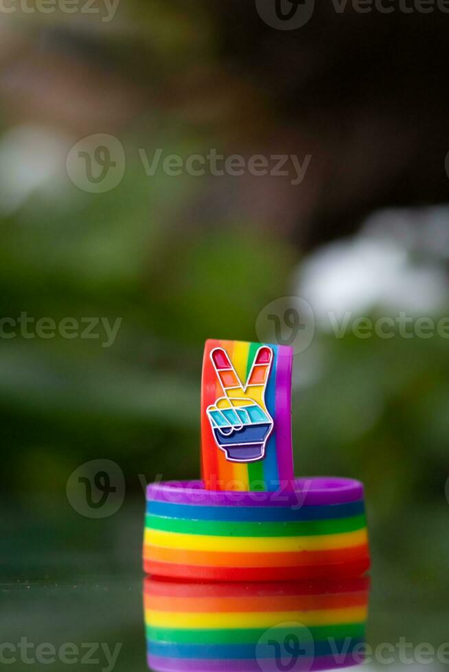 Made to symbolize lgbt Q the rainbow wristband is worn during the Gender Equality Festival and is a festival where the lgbt Q community engages in advocating for gender equality across the whole world photo