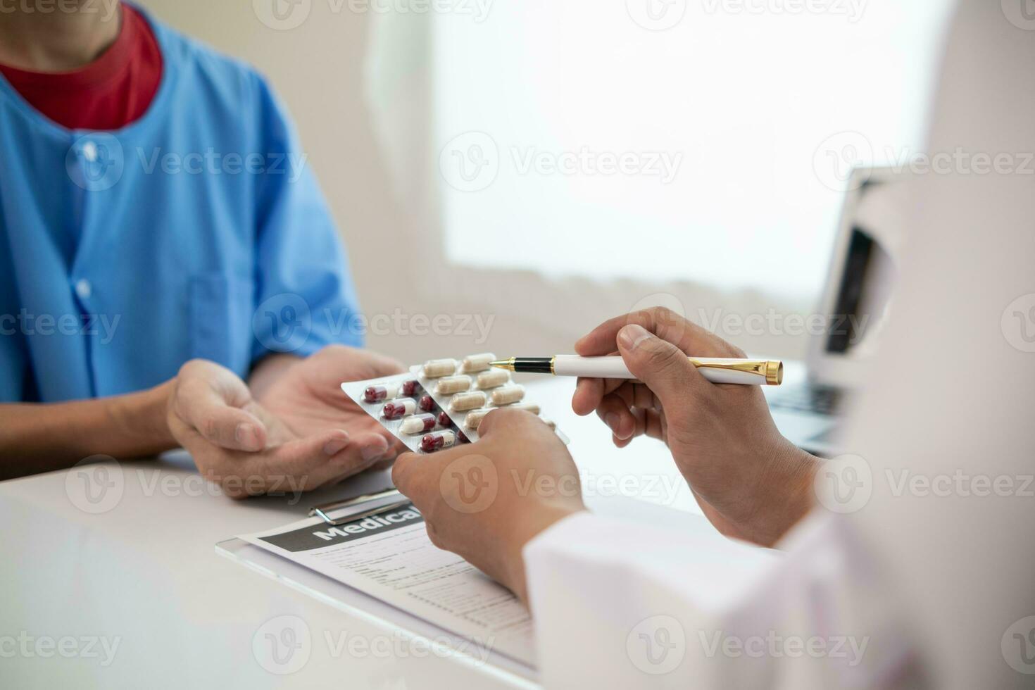A heart patient visits a medical for advice on health care and medication to treat heart disease symptoms after the medical team has diagnosed and examined the patient for heart abnormalities. photo