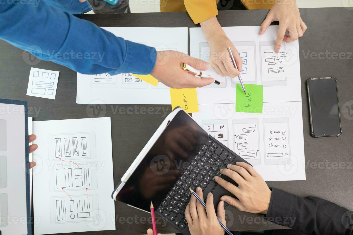team of UI UX web designer are working together to develop mobile responsive websites with UI UX front end designer previews, UI UX web development ideas, front end designer. application development photo