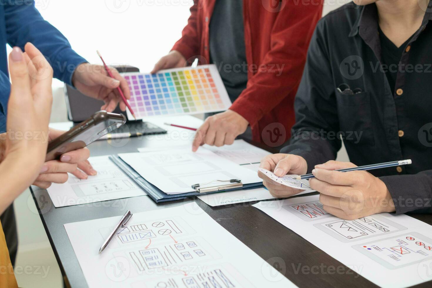 team of UI UX web designer are working together to develop mobile responsive websites with UI UX front end designer previews, UI UX web development ideas, front end designer. application development photo