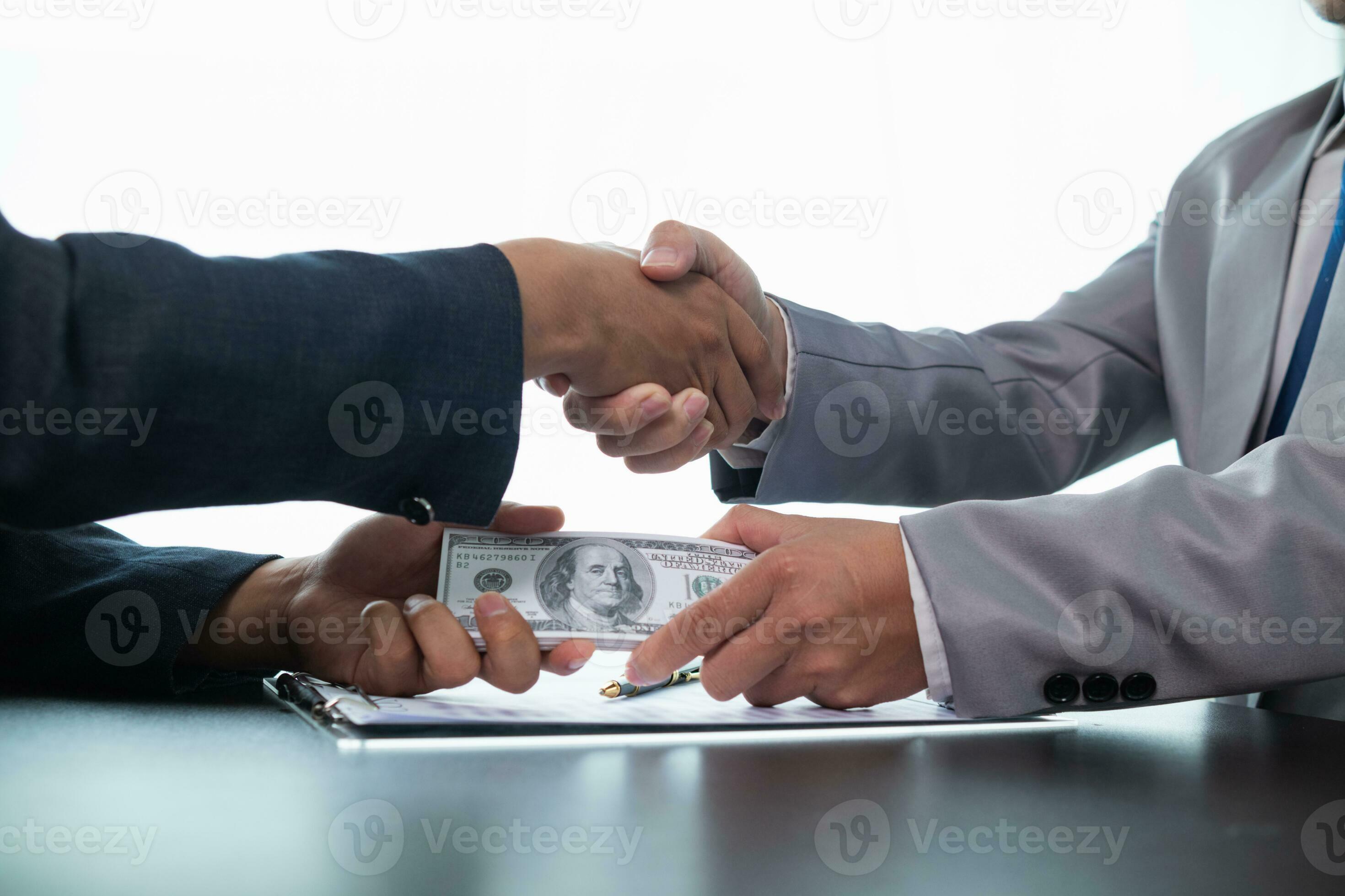 Businessmen pay kickbacks to government officials to facilitate real