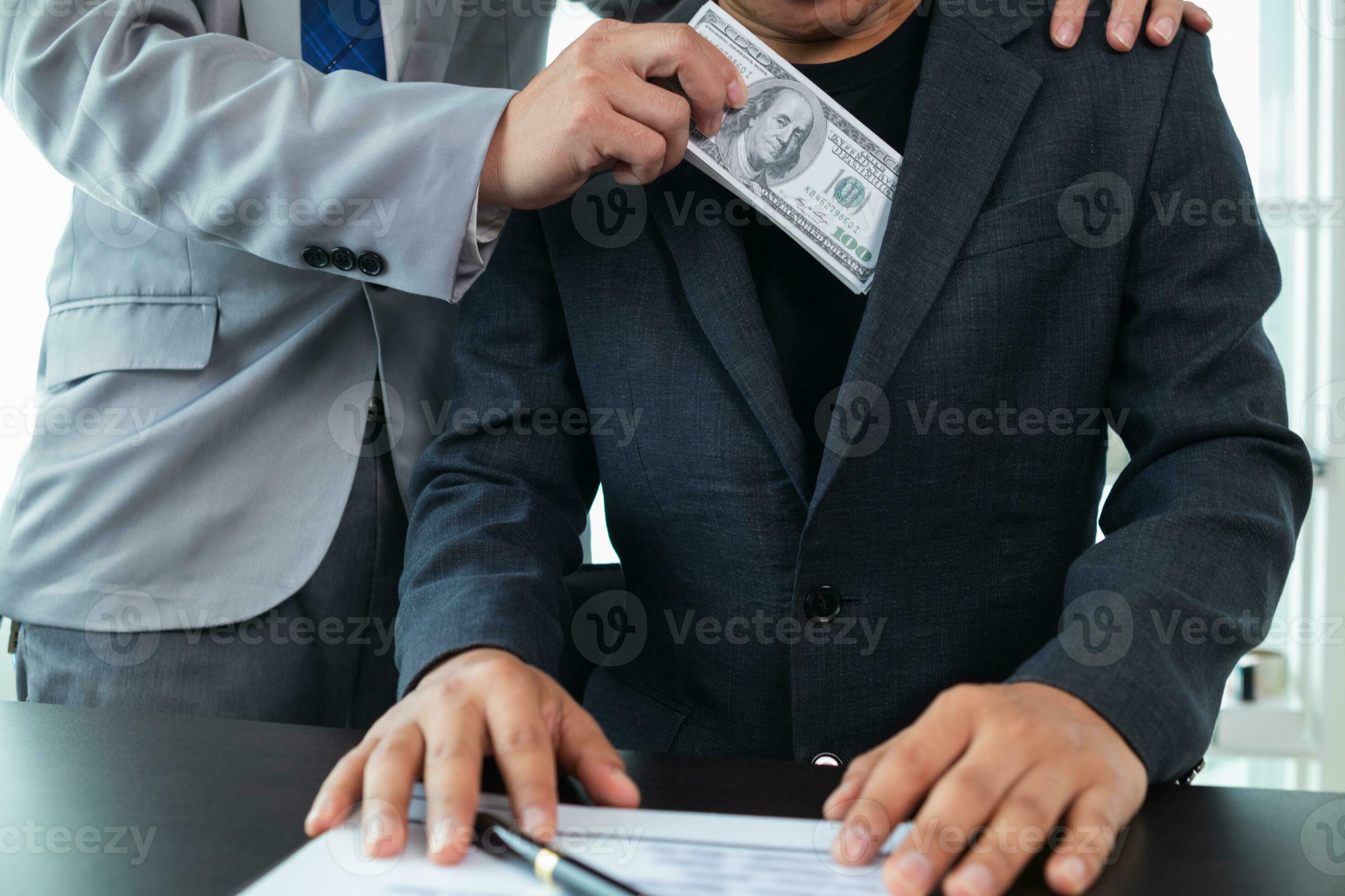 Businessmen pay kickbacks to government officials to facilitate real