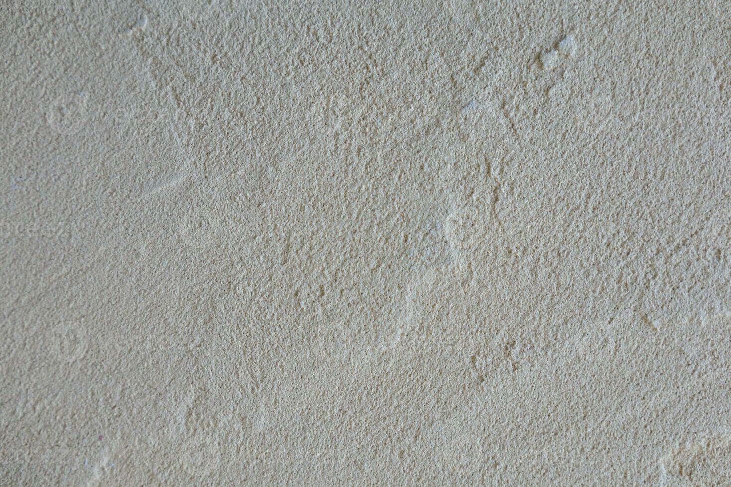 background old concrete wall that shows signs of cracking and deterioration from weather and age. Concrete backgrounds with natural textures are great for designs and include Copy Space backgrounds photo