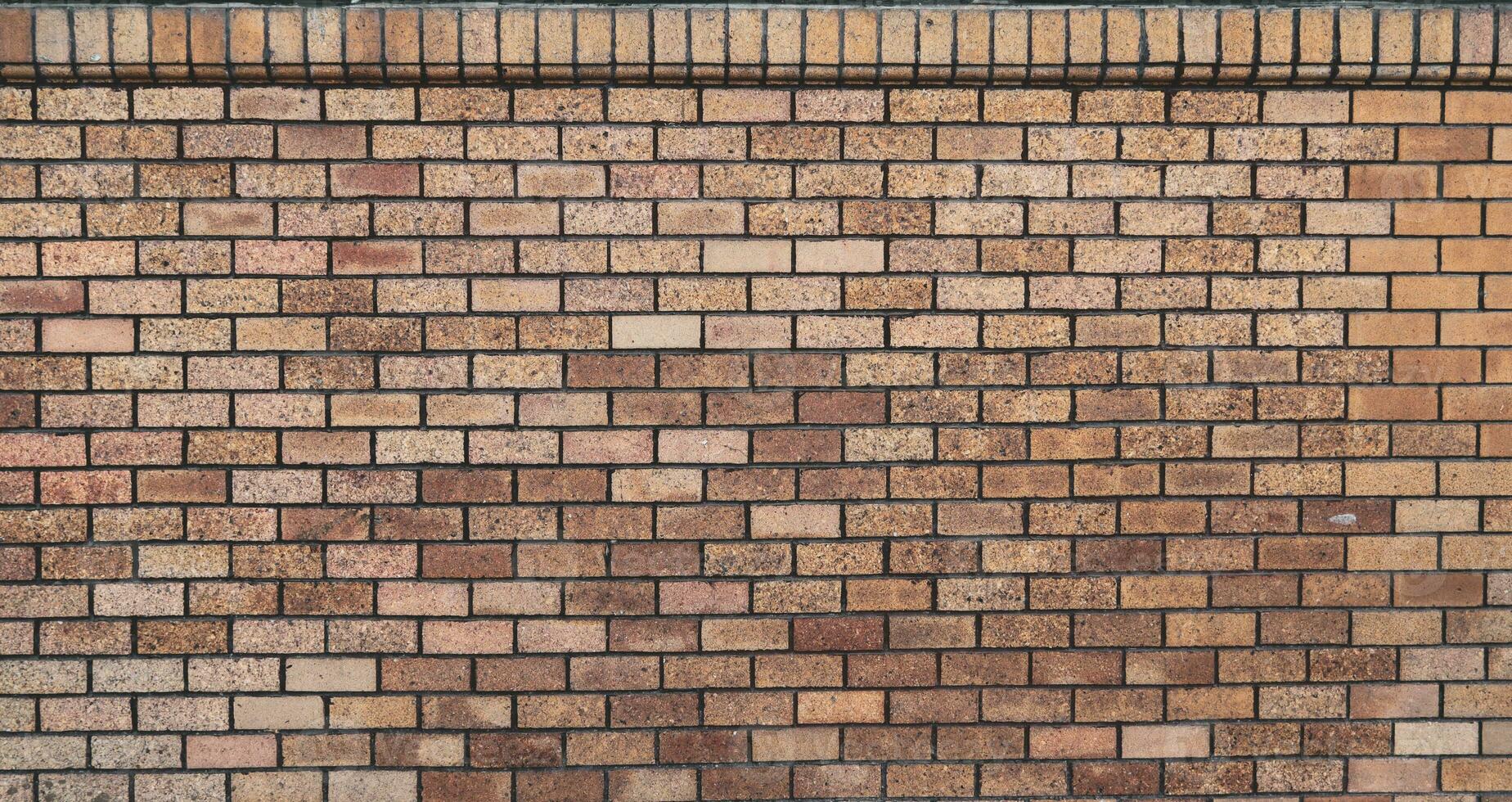 background old concrete wall that is waiting to be renovated by construction engineering team and brick wall background that is suitable for designers to use in their designs because it has Copy Space photo