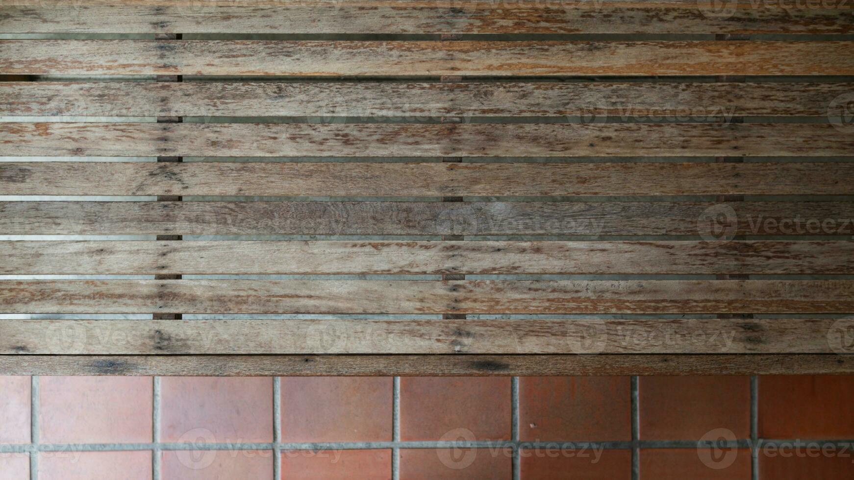 background old wooden wall that shows signs of cracking and deterioration from weather and age. Wooden wall backgrounds with natural textures are ideal for design and Copy Space backgrounds. photo