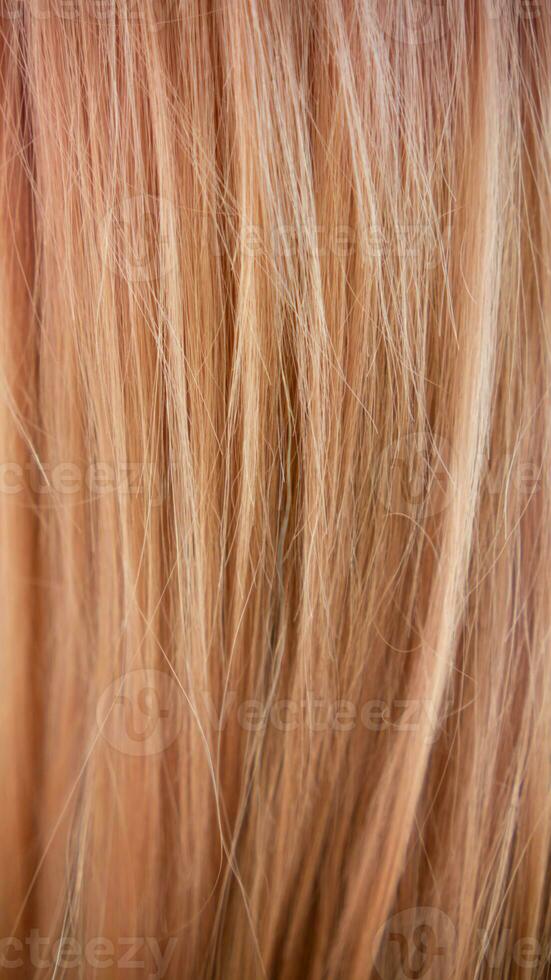 colorful background of on a young woman head after having her hair changed to a fresh color by a hair salon. Lots of hair as a beautiful, naturally lined background with Copy Space for text. photo