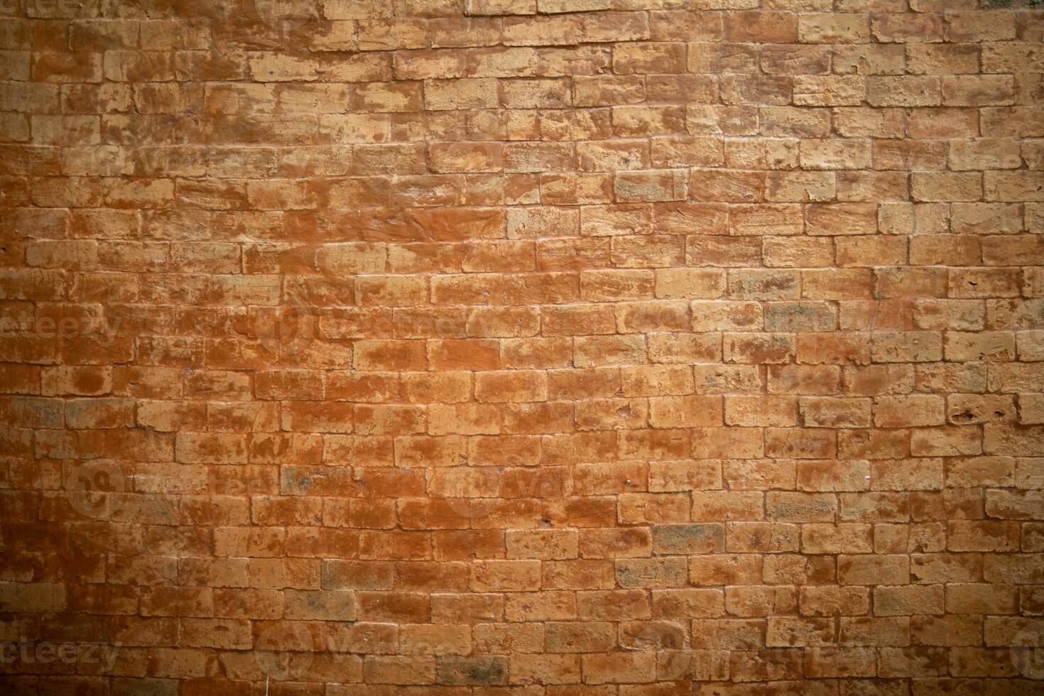 background old concrete wall that is waiting to be renovated by construction engineering team and brick wall background that is suitable for designers to use in their designs because it has Copy Space photo