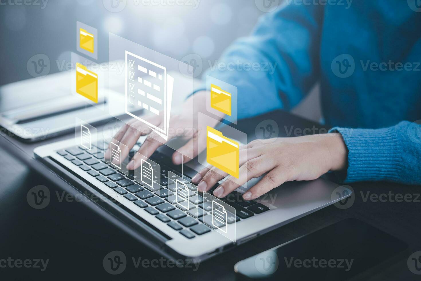 Online documentation database and document management system concept, Businessman using a tablet or computer, Document Management System and Automation software to archiving and efficiently manage. photo