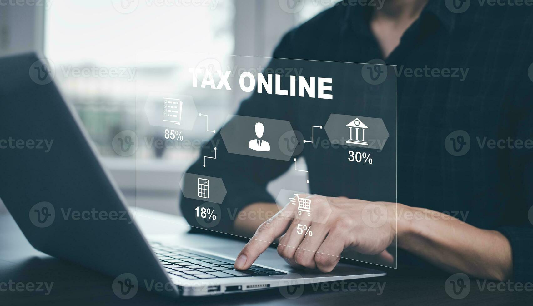 Man using a laptop with TAX REFUND and refund tax of duty taxation business, graphs and chart being demonstrated on the screen media,  tablet pc and selecting tax refund, Saving tax for business photo