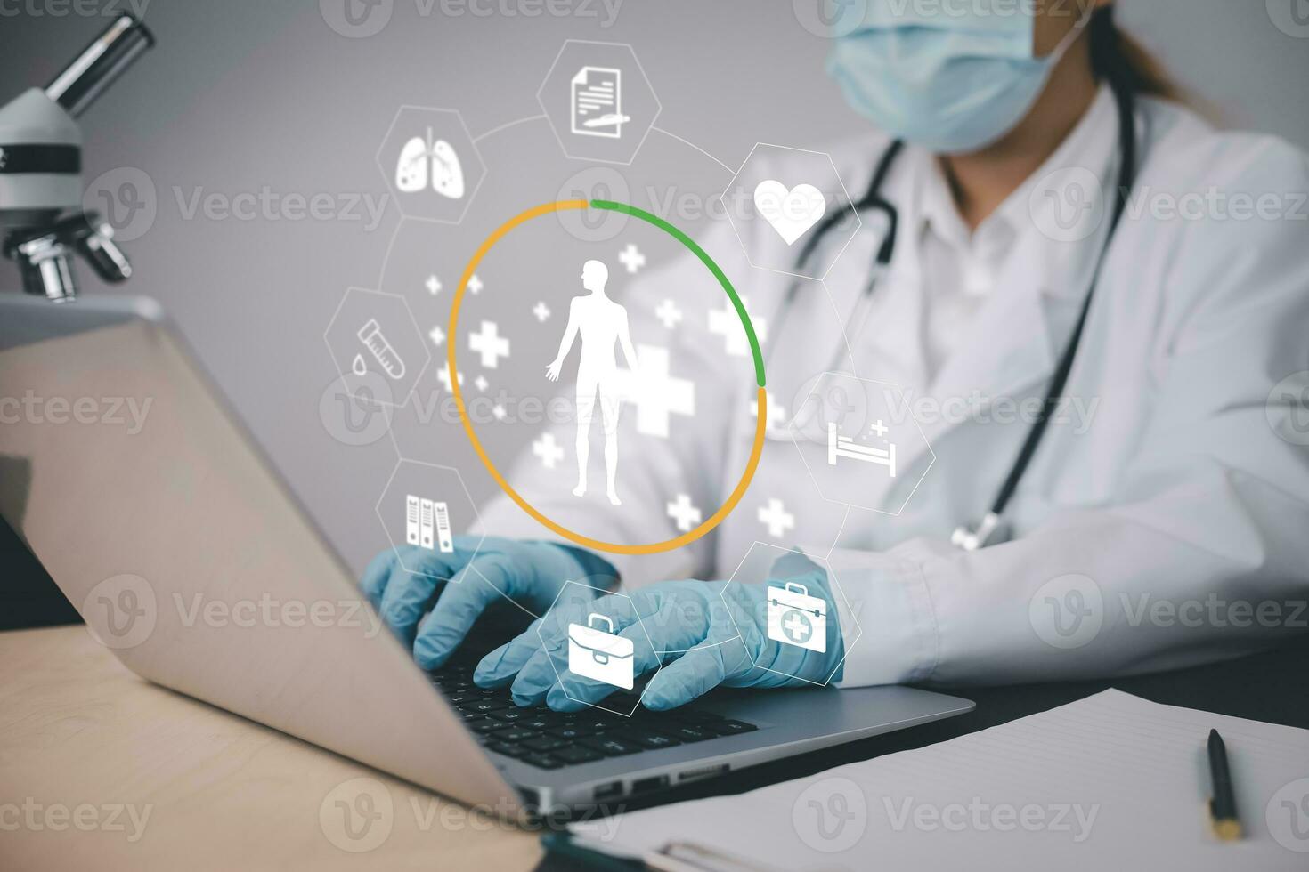 Medical doctor and medical technology and futuristic concept, Doctor using laptop and health medical network connection icon on virtual screen interface, Modern medical technology and innovation. photo