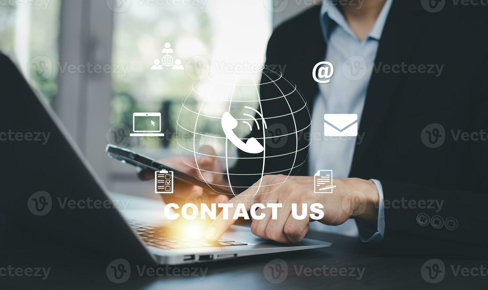 Communication and Contact us or Customer support hotline people connect. Hand using a laptop and touching on virtual screen contact icons, email and address, live chat with internet wifi. photo