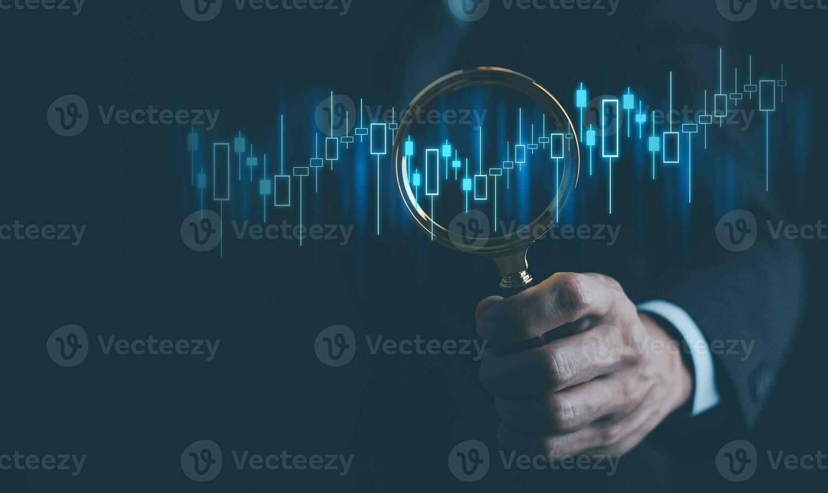 Ideas and perspectives, Stock investment stock market for analysis technical grap. Businessman hand holding magnifying glass with virtual stock market chart, Business investment earning income concept photo