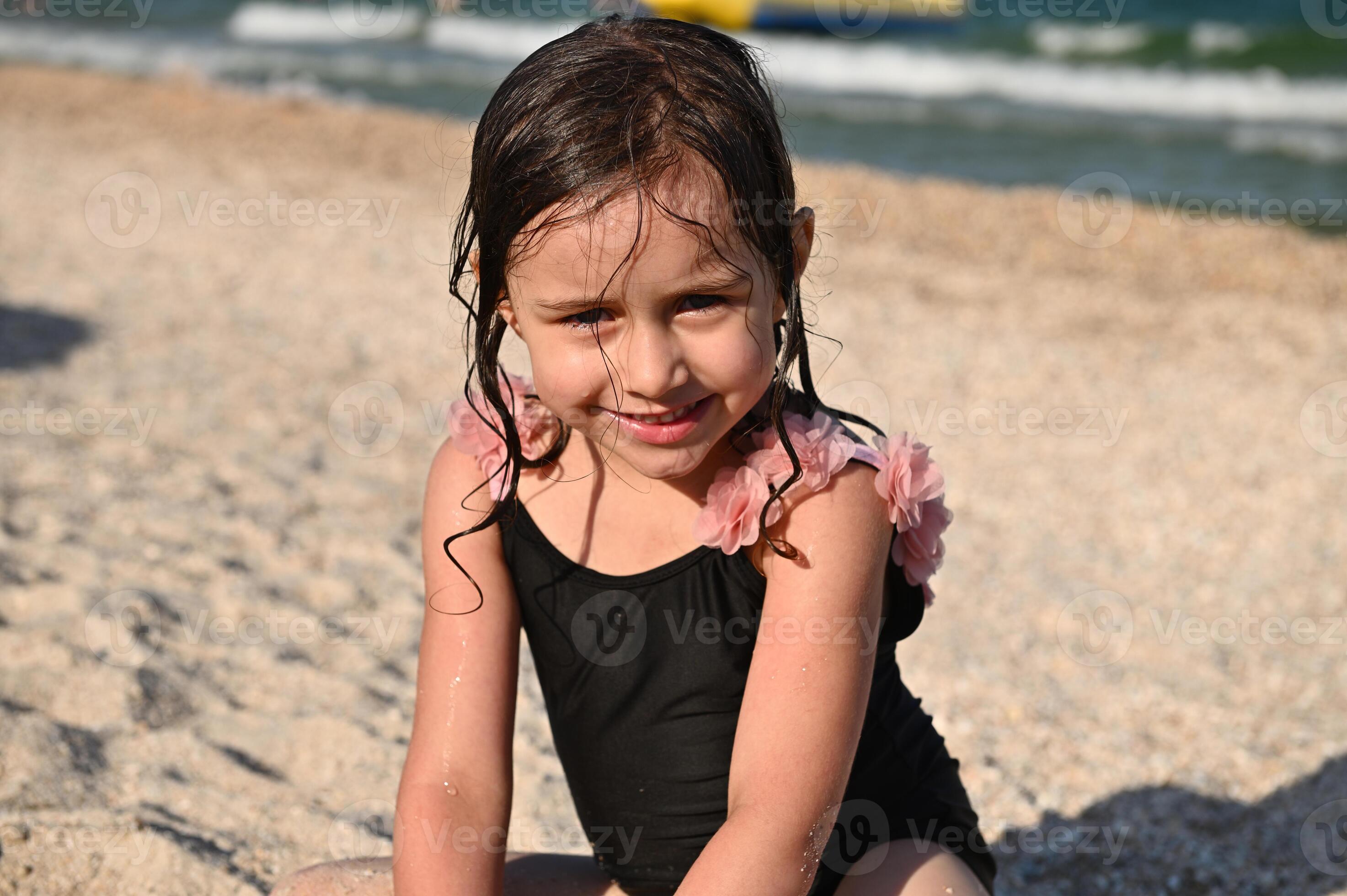 kids girl on the beach 