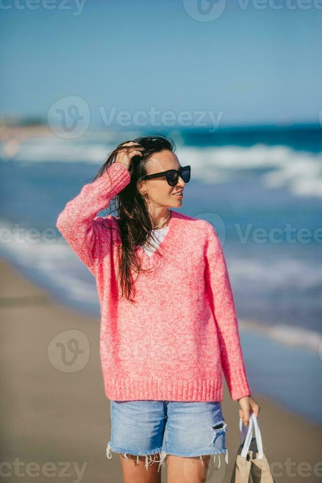 Young beautiful woman on the beach vacation photo