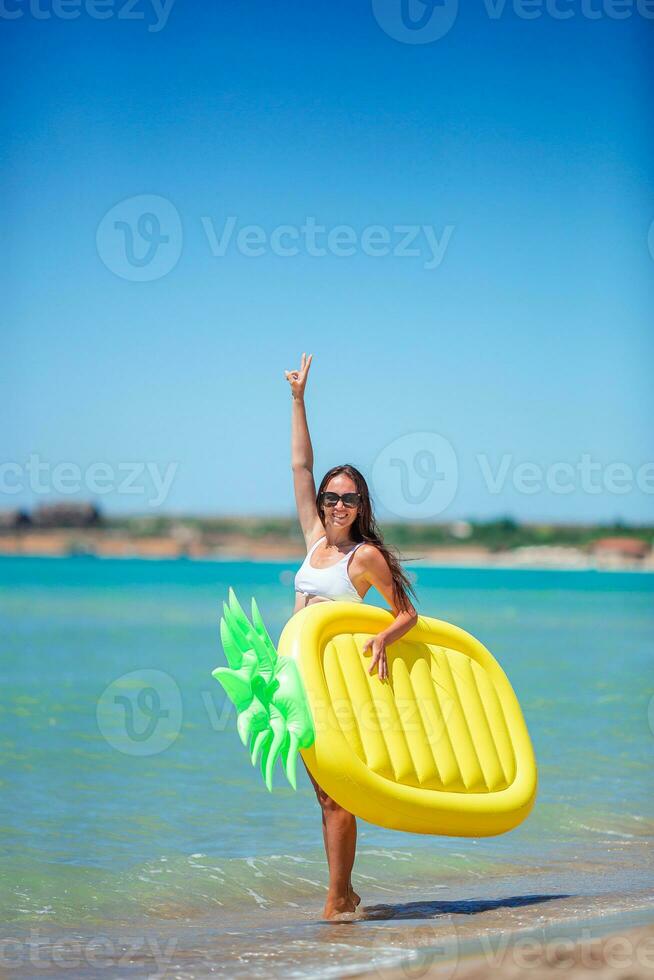 Young beautiful woman on the beach vacation enjoy summer day photo