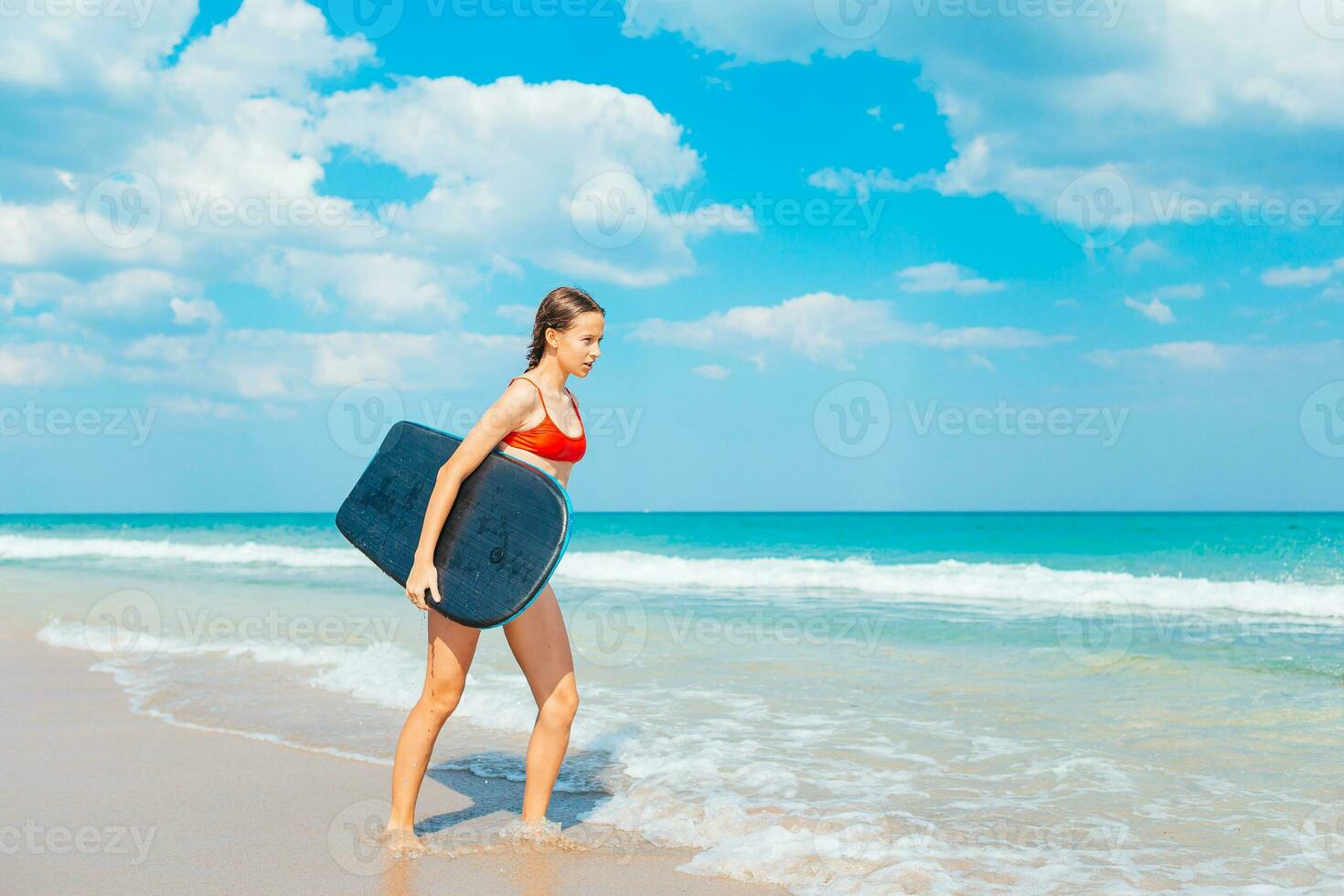 Adorable slim girl in a swimsuit with a perfect figure on the beach  18044088 Stock Photo at Vecteezy