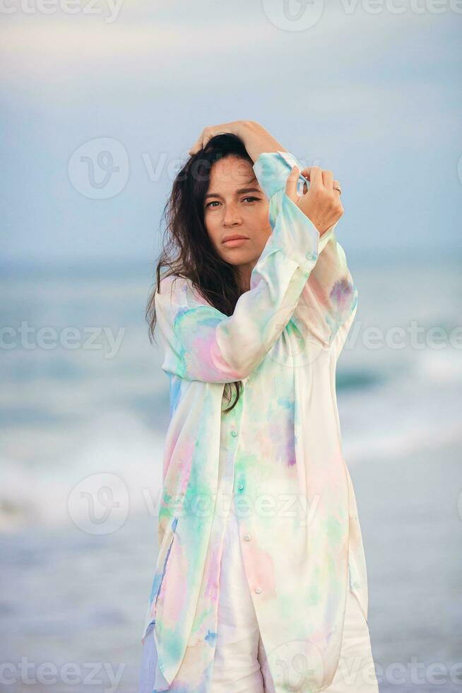 Young beautiful woman on beach vacation on Caribs photo