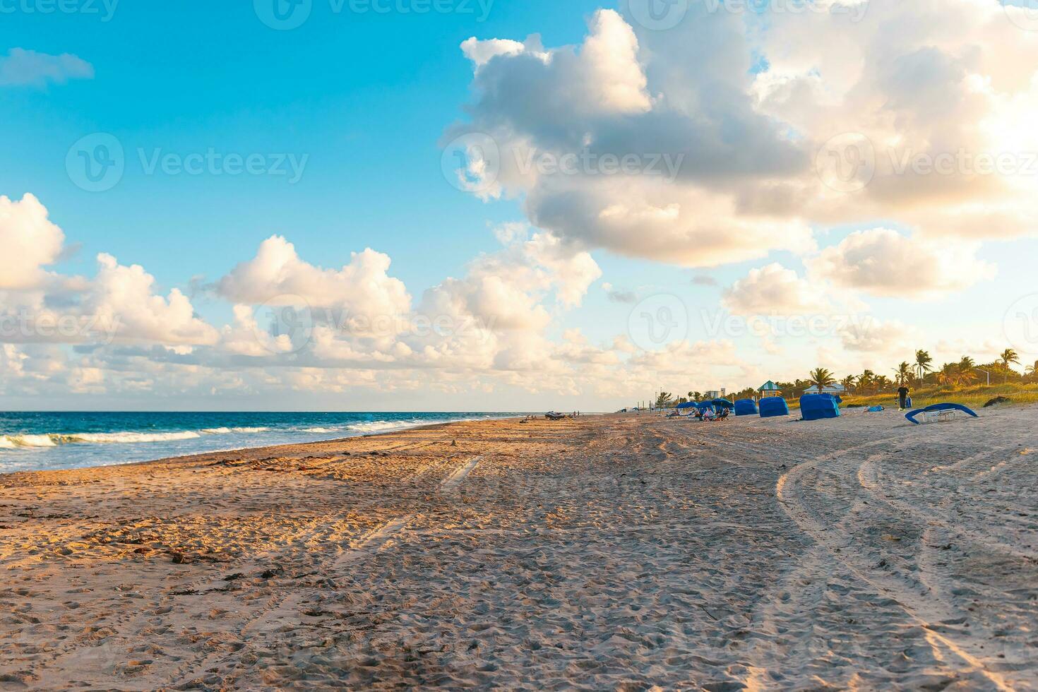 Sandy seashore at sunset. Beautiful beach in Florida photo