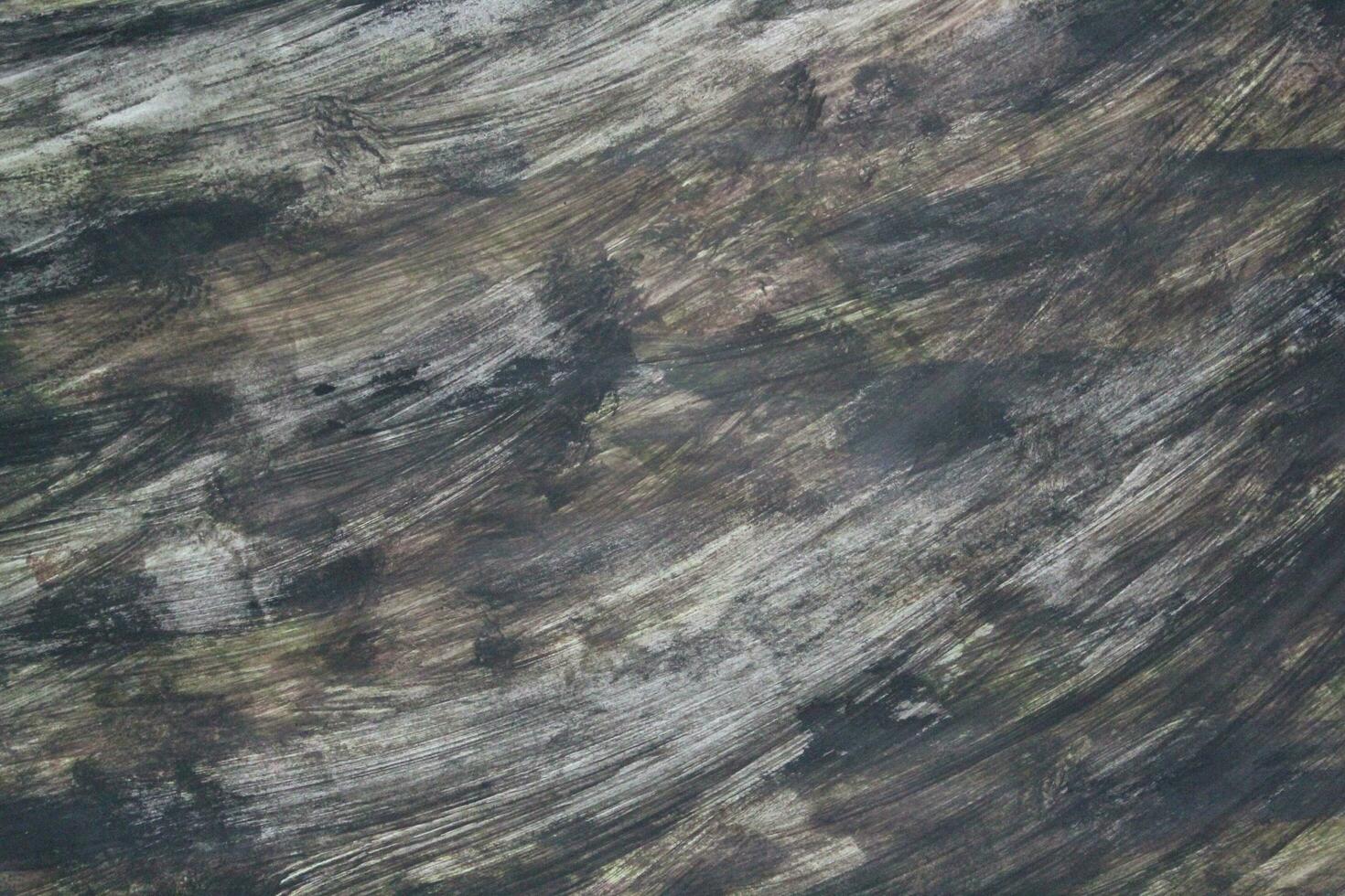 Multicolor paint brush pattern surface, Grungy paint surface backdrop, Colorful paint brush pattern background photo