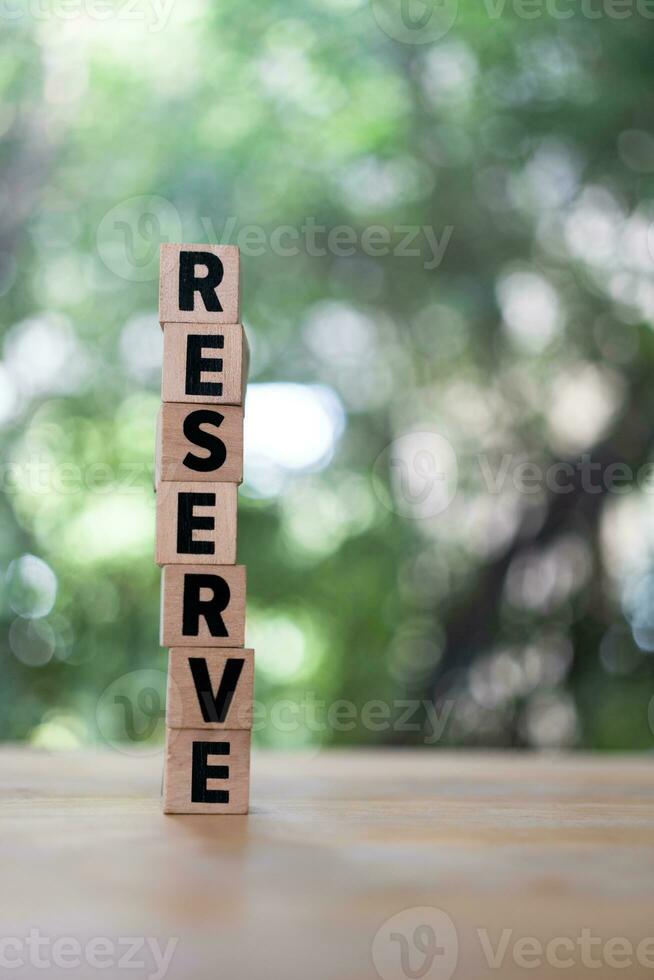 Word RESERVE made with wood building blocks photo