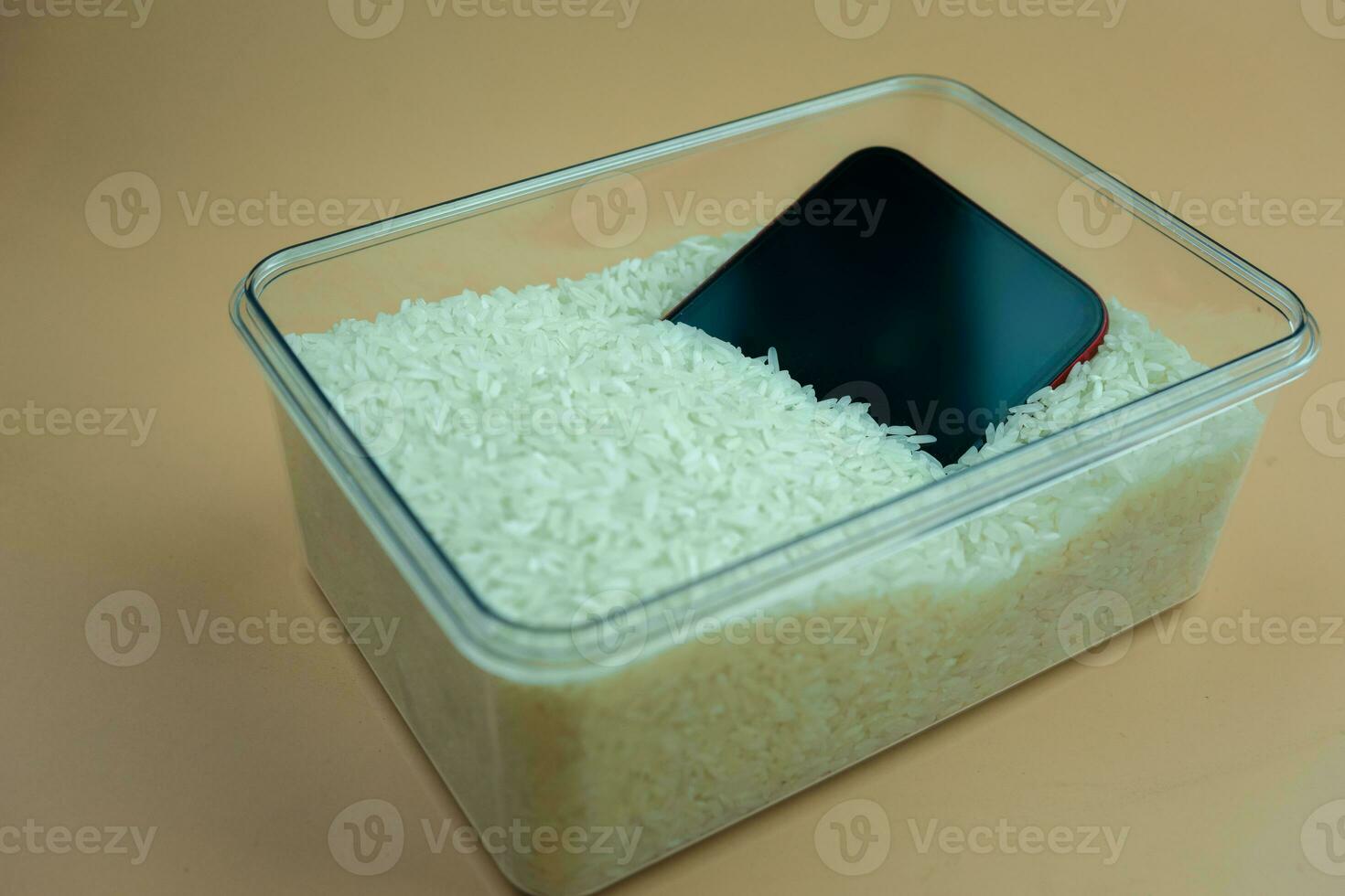 Mobile phone is dried put in raw rice in the box will fix it. photo