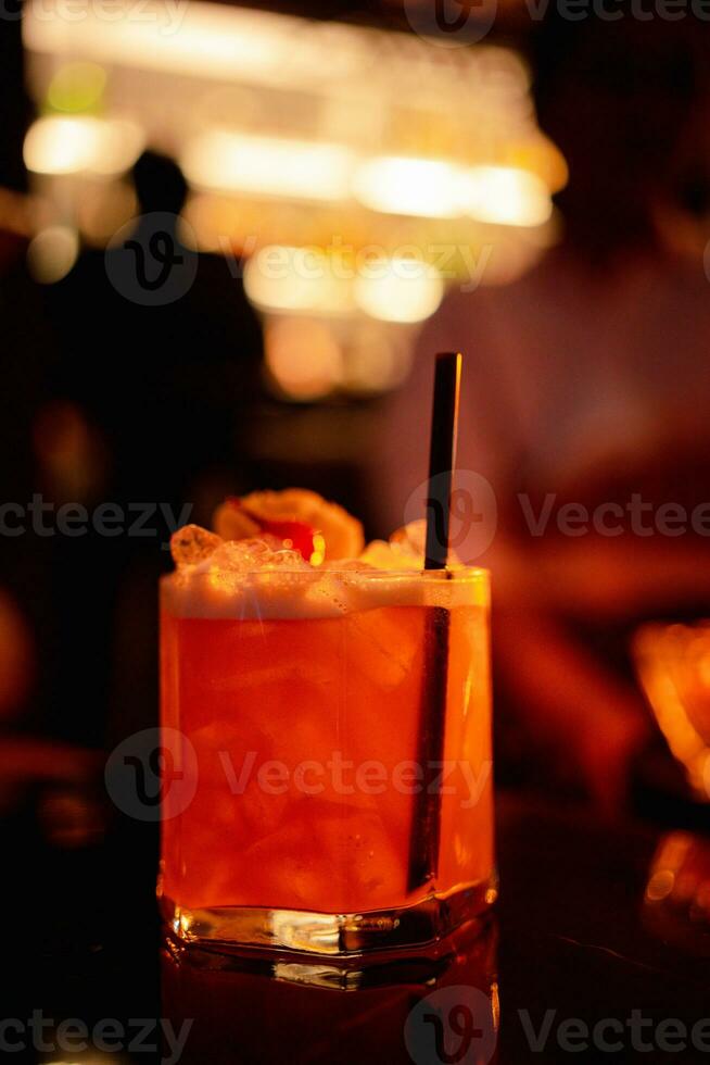 Close up a glass of transparent cocktail photo