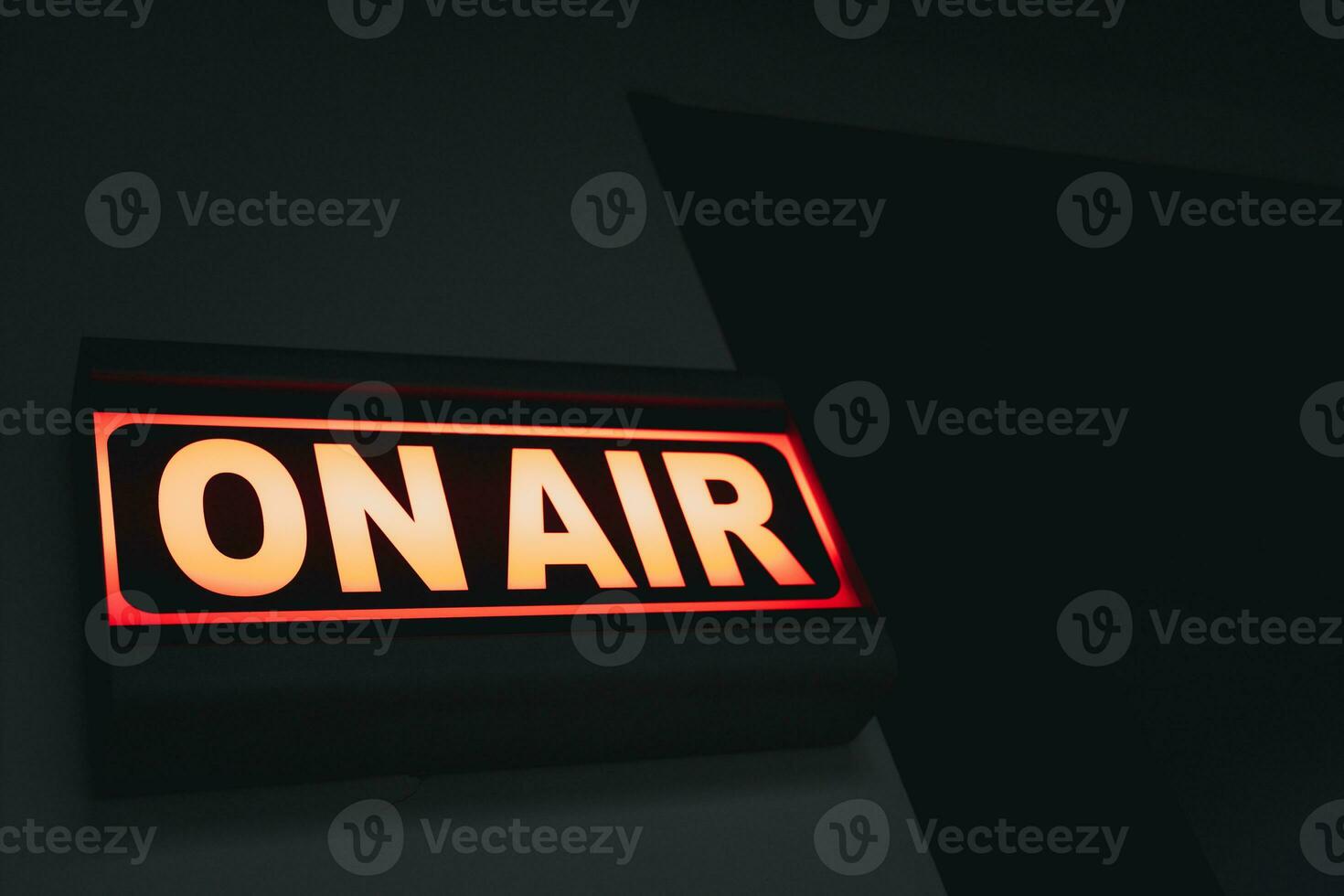 Live online radio studio with on air sign photo