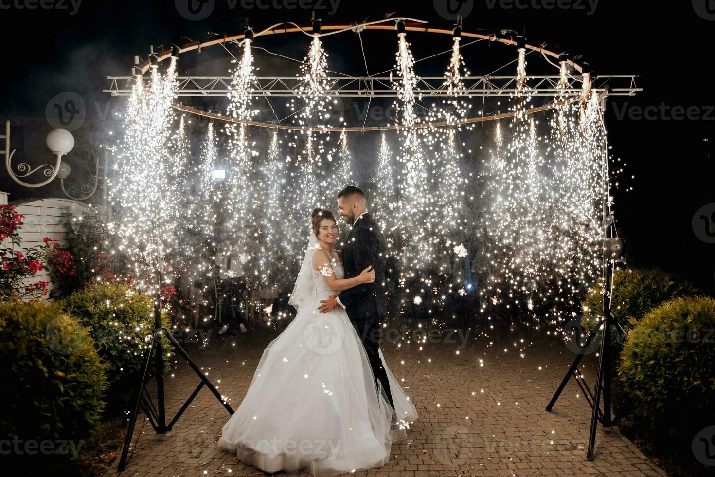 First wedding dance of newlywed. Happy bride and groom their first dance. brides wedding party in the elegant restaurant with a wonderful light and atmosphere photo