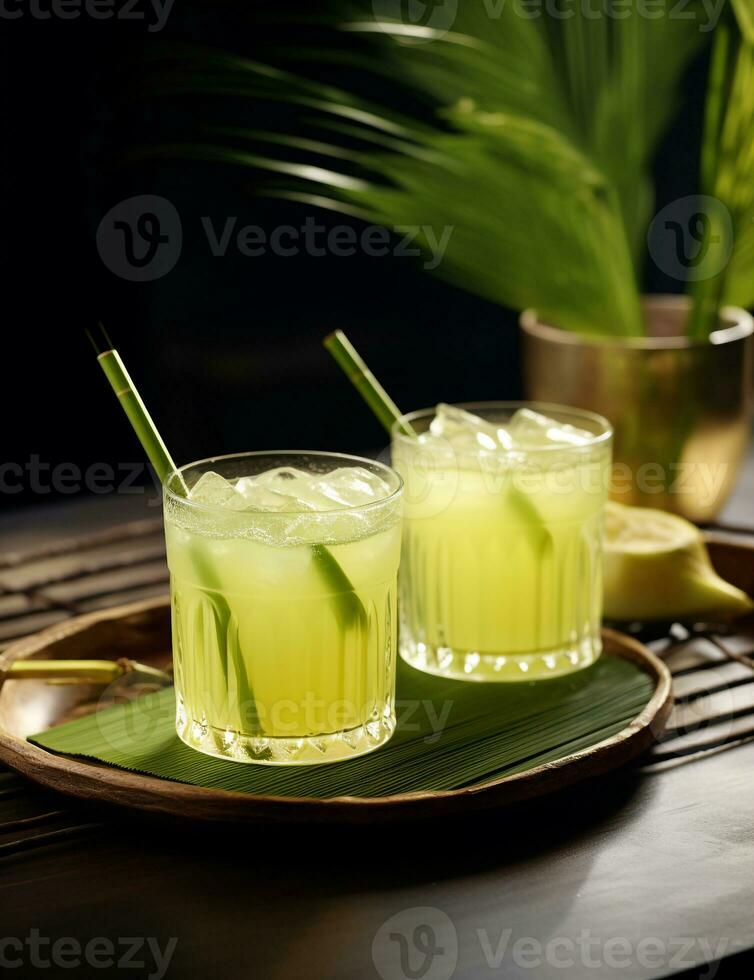 Photo of some Sugarcane Juice drink elegantly plated on a table. Generative AI
