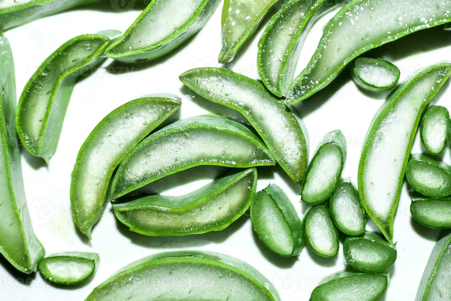 Fresh aloe vera slice top view background,  Natural organic aloe vera slice photo