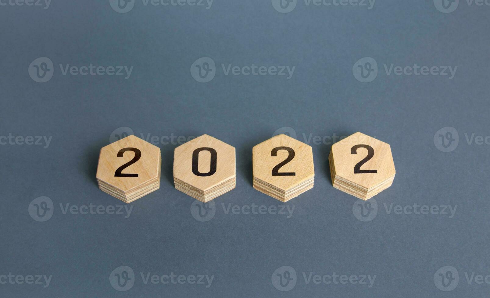 Hexagons with numbers 2022. New Year and Christmas holidays. New plans and goals. Trends ideas. Summing up, drawing conclusions. Next stage. Future. Business planning. Analytics, forecasting photo