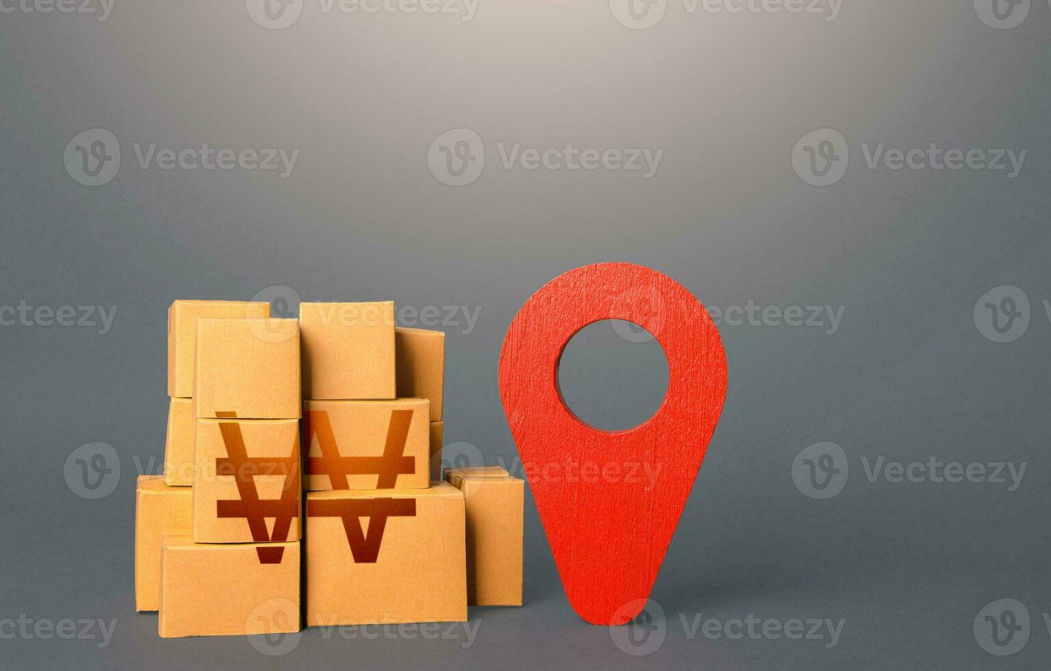 Cardboard boxes with south korean won and red pin location tracking symbol. Transportation logistics, warehouse management. Import export. Delivering. Freight infrastructure. Tracking of deliveries. photo