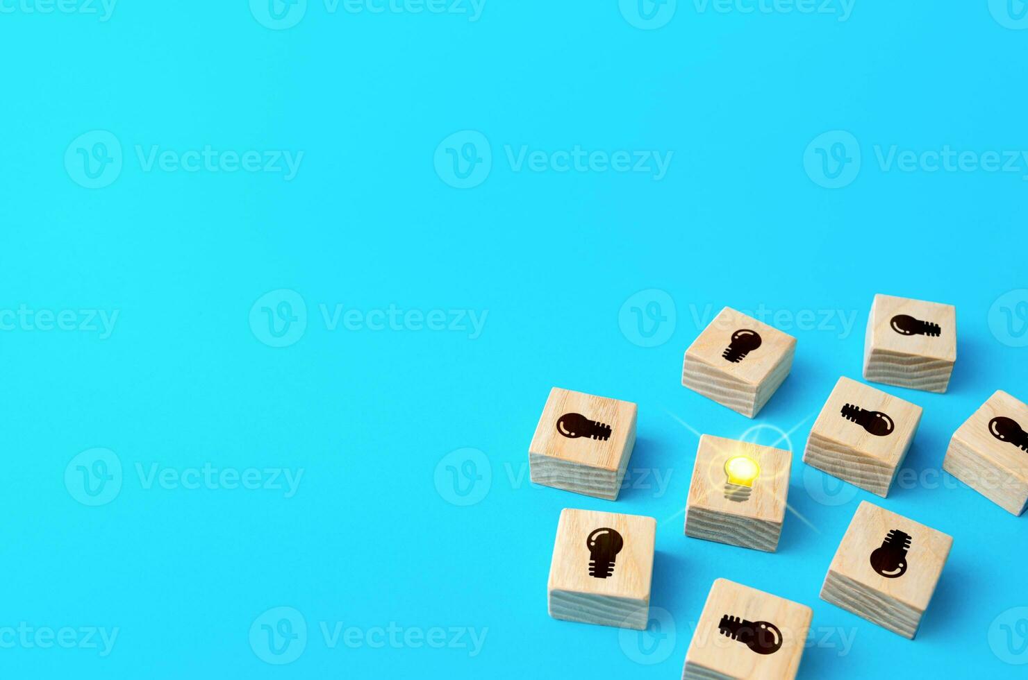Scattered light bulbs of ideas. Investment in a promising startup. Initiative and success. Innovation, technological breakthrough. A promising business idea. First result. Search for a solution. photo
