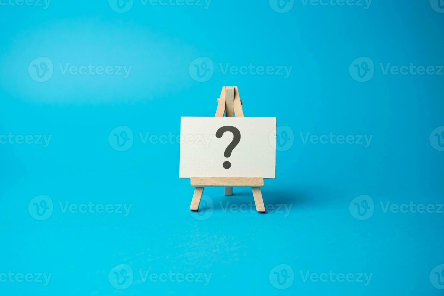 Question mark on the stand. Asking questions and seeking answers. Explore the unknown and seek information. Search for solutions. Critical thinking, evaluation, and analysis. photo