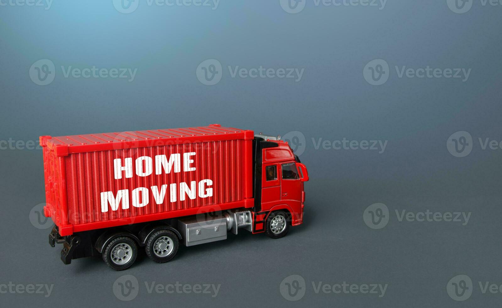 Home moving truck transporting company. Delivery services to another house. Relocation to a new housing. Transportation and delivery of things and furniture. Loading and unloading. photo