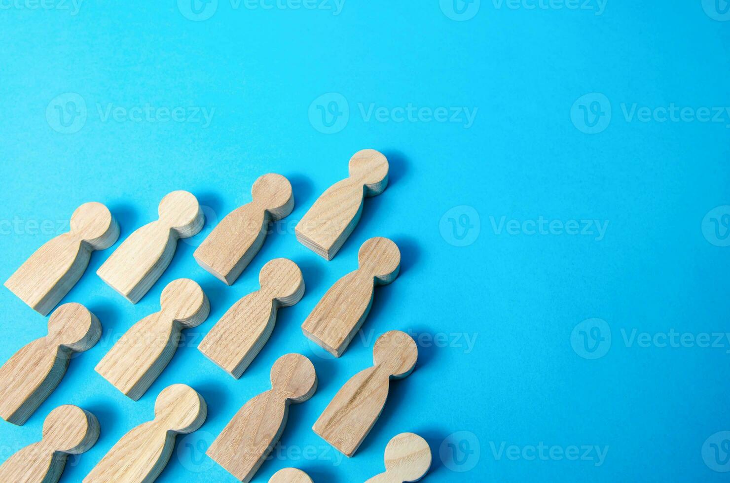 A group of people in the shape of an arrow. Social organizations, commercial structure. Organization, joining consolidated forces. Team building, teamwork cooperation. Discipline in hierarchy. Unity. photo