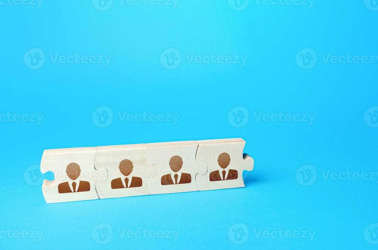 Connected puzzles people. Concept of recruiting new employees and expanding the staff of business company. Team building and bonding. Recruiting specialists. Partnership and cooperation. Collaboration photo