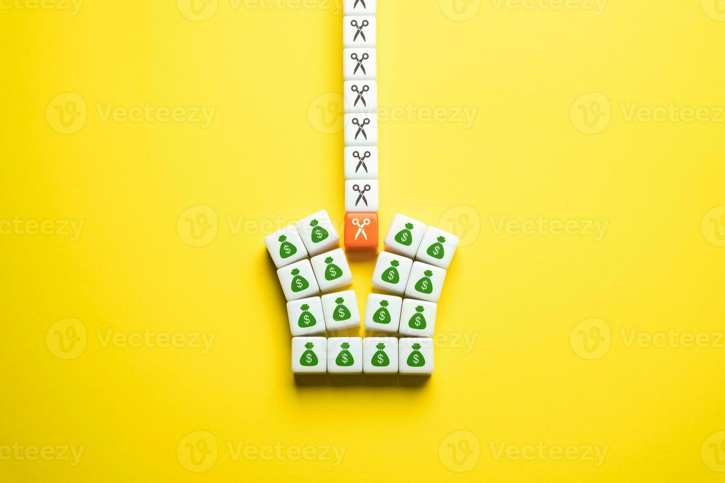 Budget cuts, tough economy. Cutting spendings. Scissors split the budget in half. Optimization of costs. Division of property after divorce. Inflation and the global crisis. Capital, savings. photo