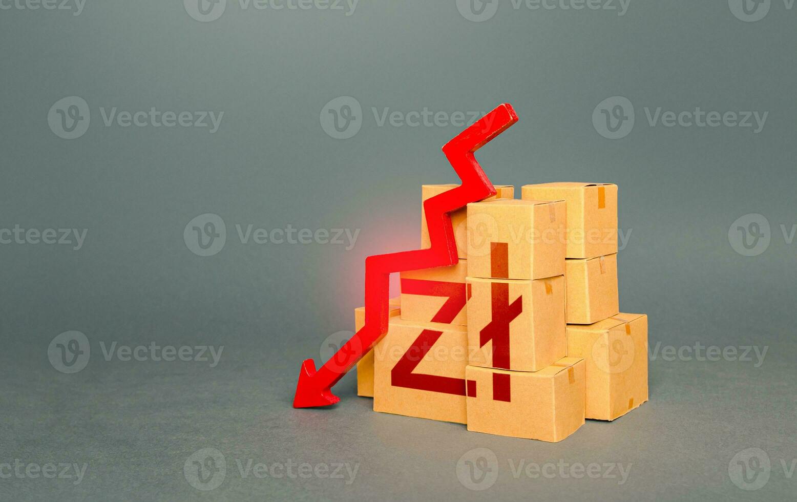 Boxes with polish zloty symbol and down arrow. Decrease in stocks of products. Fall in the production of goods. Embargo, sanctions. Low consumption. Economic slowdown. Price reduction. Worsening trade photo