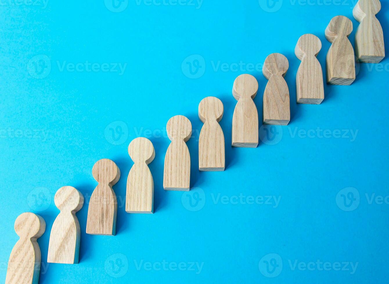 Figures of people in a row. Society, demography. Selection concept, choice. Group, crowd. Discipline and order. Recruiting human resources. Staffing. Search for new employees workers, hiring for work. photo