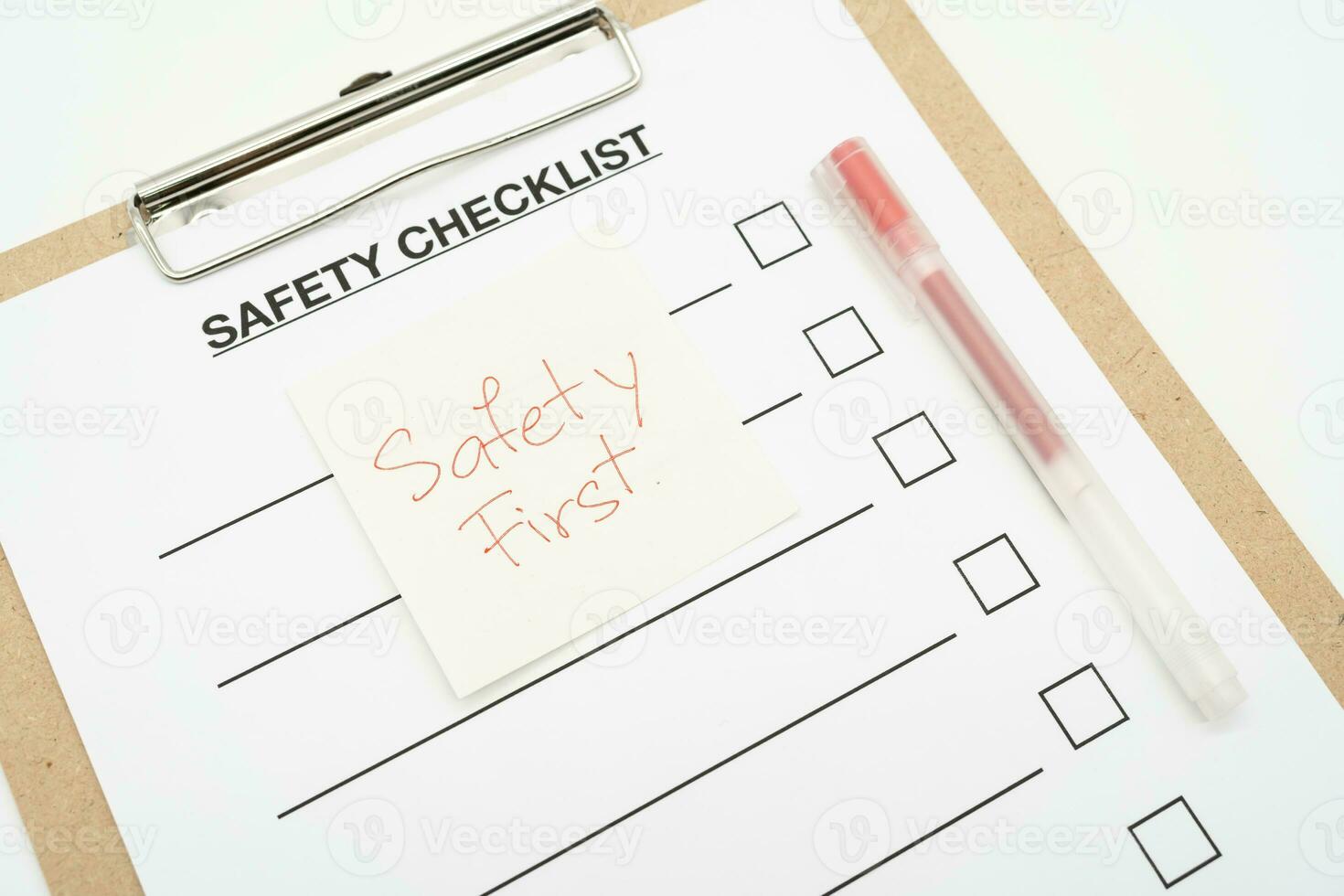 Safety First Text Note. Blank checklist paper during safety audit and risk verification. safety checklist form. photo