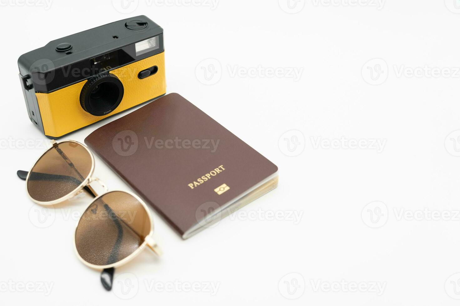 Vintage camera, Passport with Sunglasses. Minimal hipster summer trend. Retro design camera for travel. Summertime concept. Travel, Holiday, Vacation in summer concept. photo