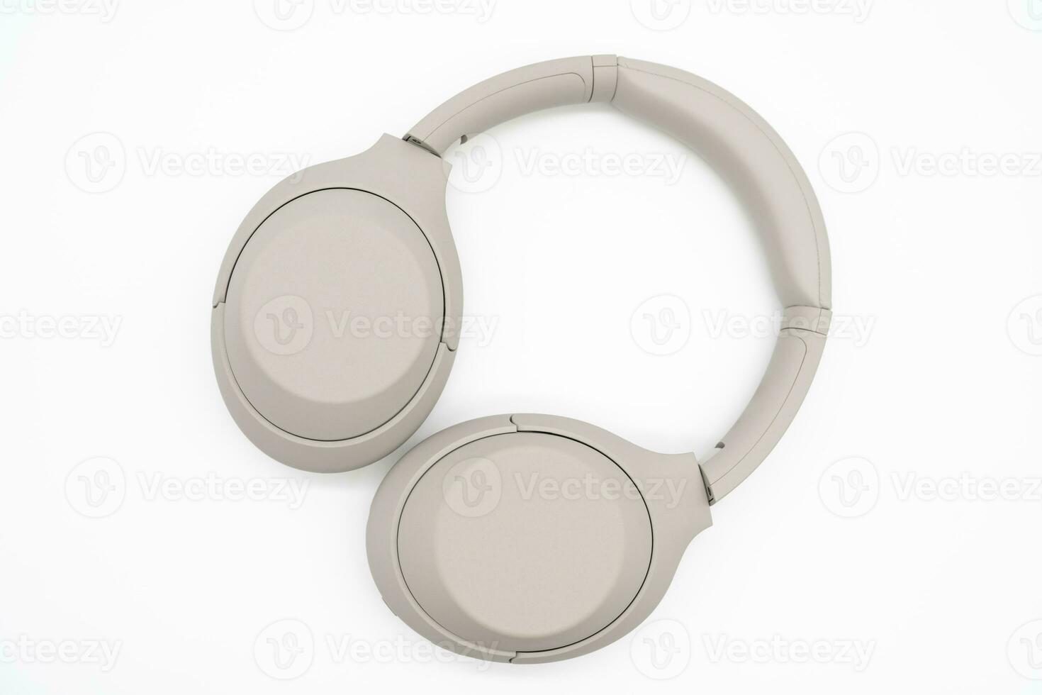 Wireless Silver headphones background on isolated background. With Noise Cancelling and Integrated Microphone. photo