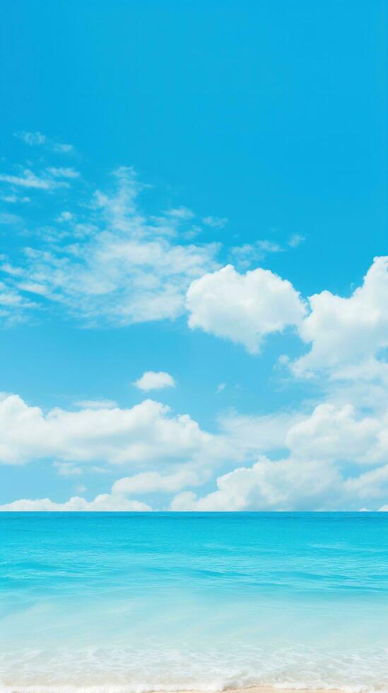 Dreamy beach with blurred ocean waves and sky photo