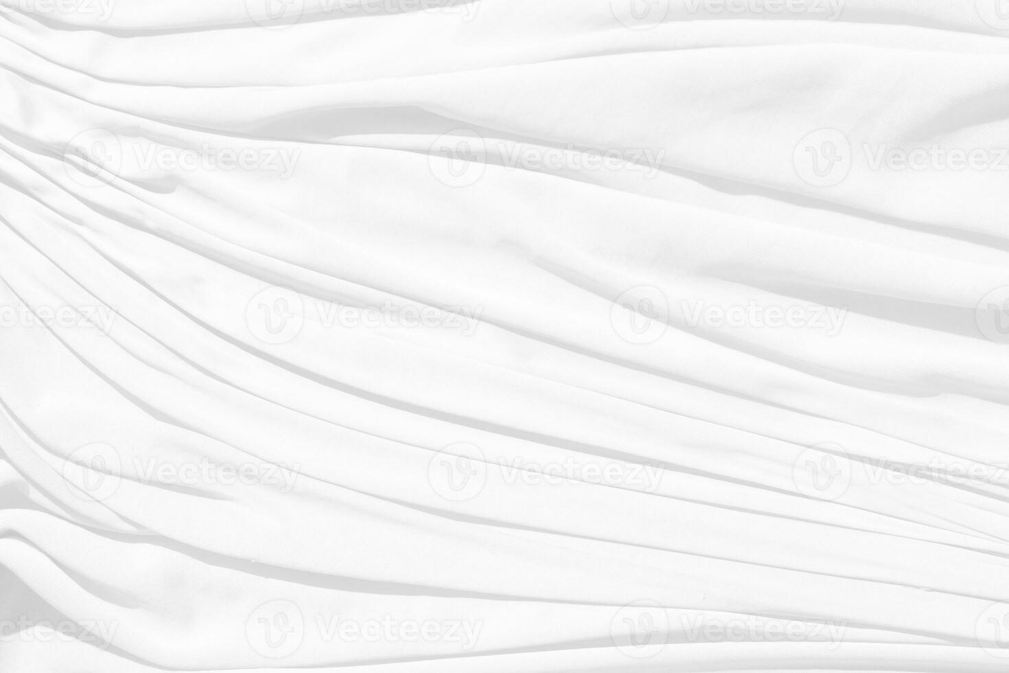 Top view Abstract White cloth background with soft waves.Wave and curve overlapping with different shadow of color,white fabric, crumpled fabric. photo